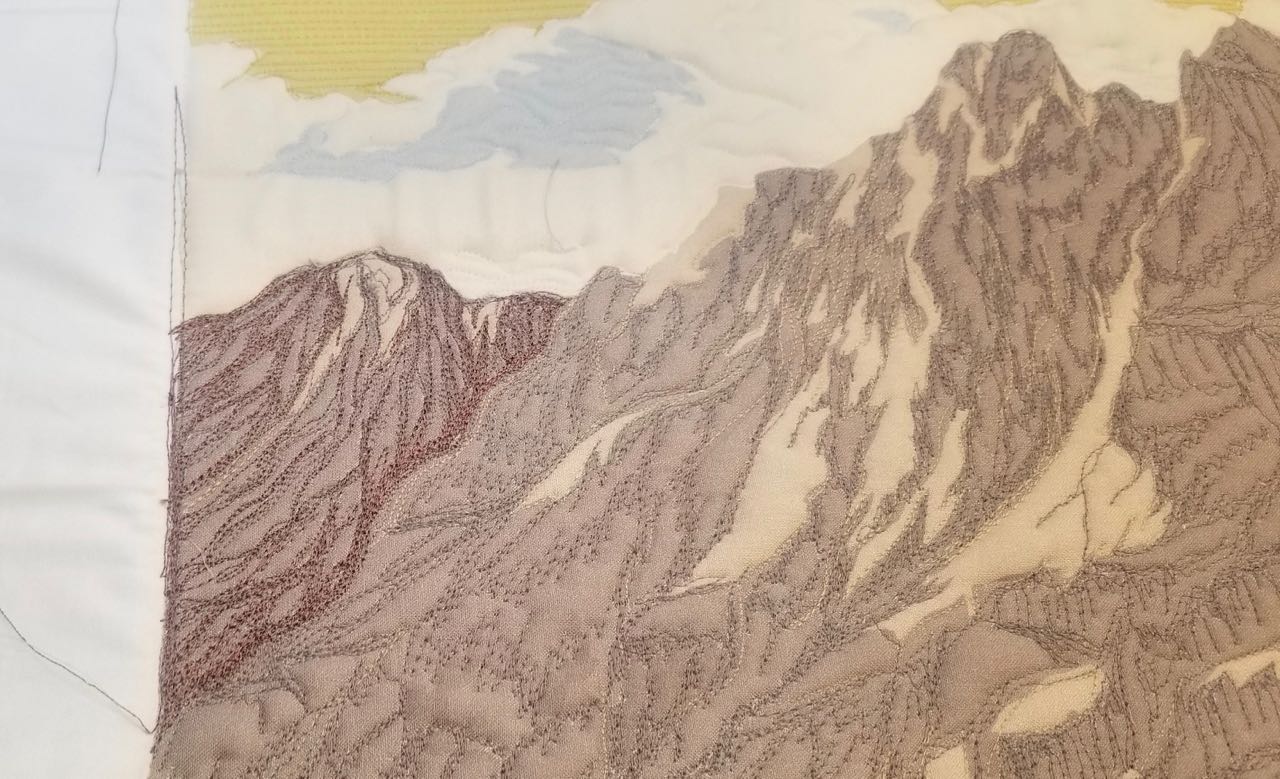 quilt with mountains