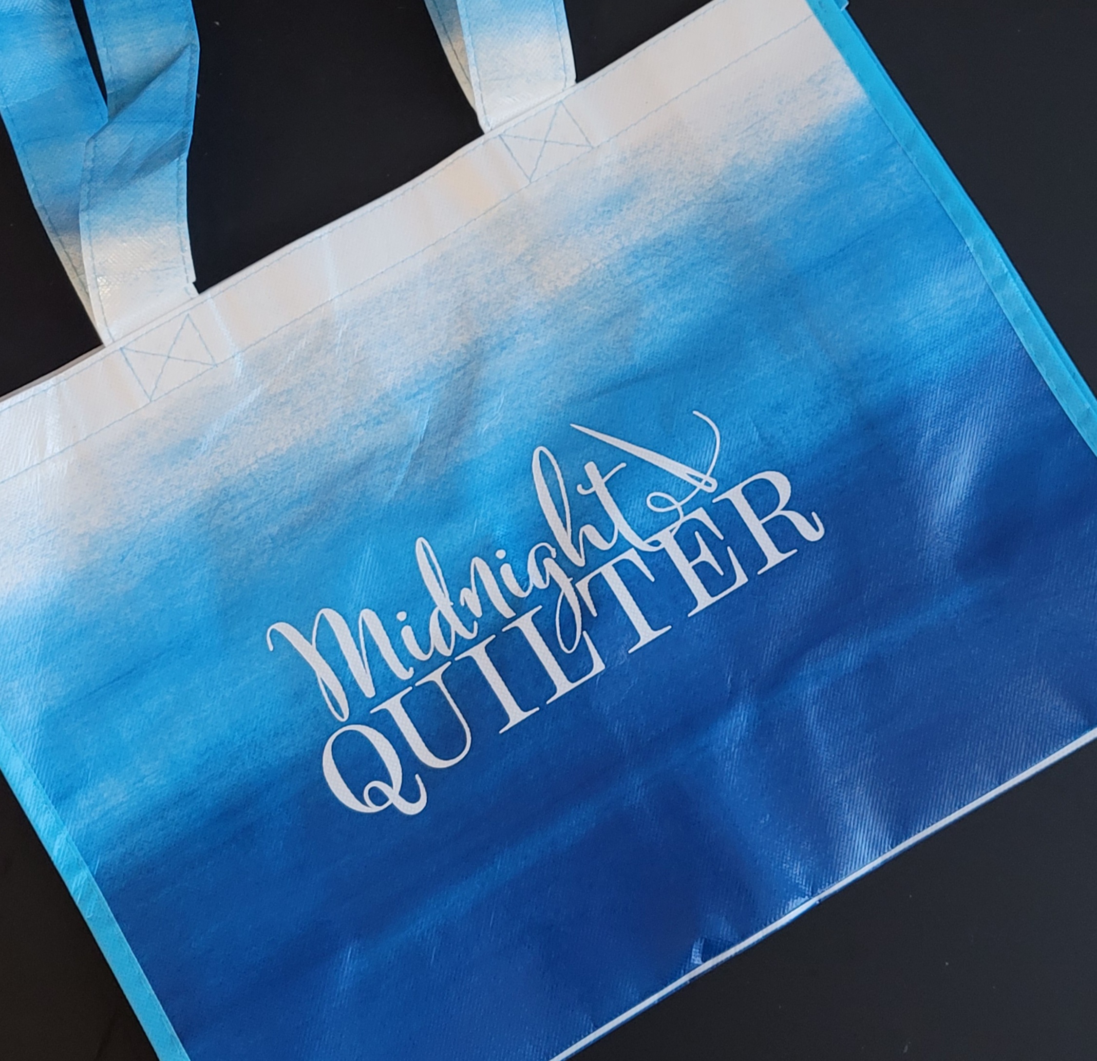 midnight quilter laminated tote